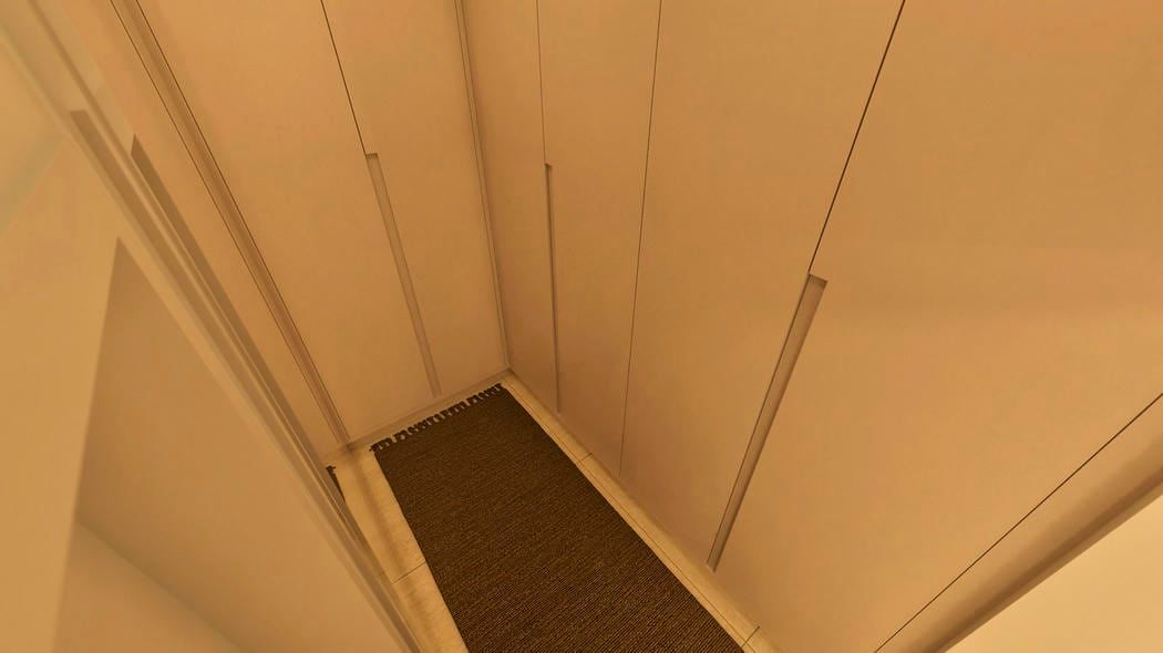 Closet planejado com acabamento em madeira clara