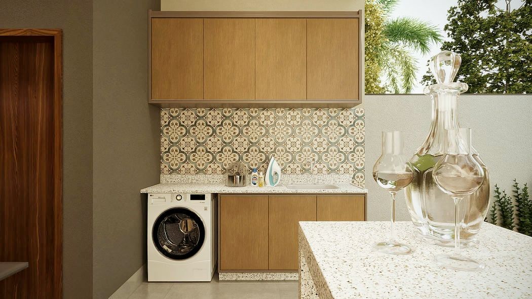 Área gourmet com bancada e churrasqueira