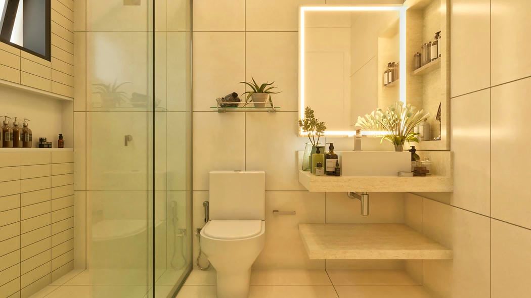 Banheiro em tons neutros com revestimento claro